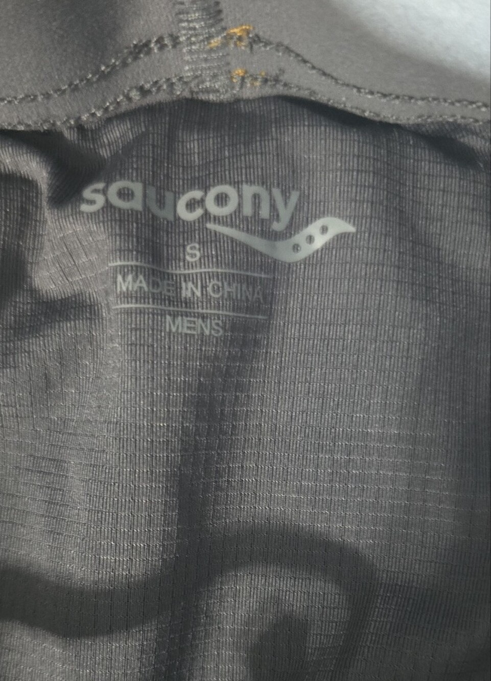 Saucony Outpace 5" running shorts In "Bronze" - Picture 10 of 11